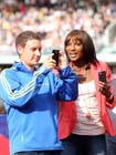 Denise Lewis looks at photos, 2012 Samsung Diamond League, Birmingham.